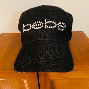Bebe written with crystals on a black baseball hat.  Never wore it.